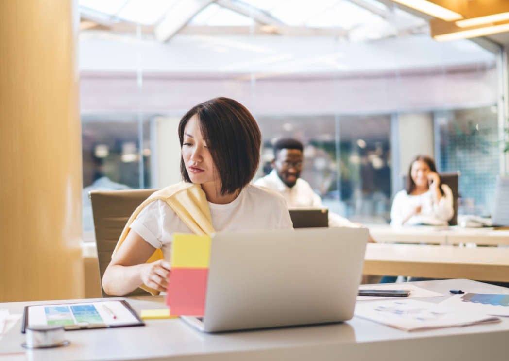 Image of woman working on laptop