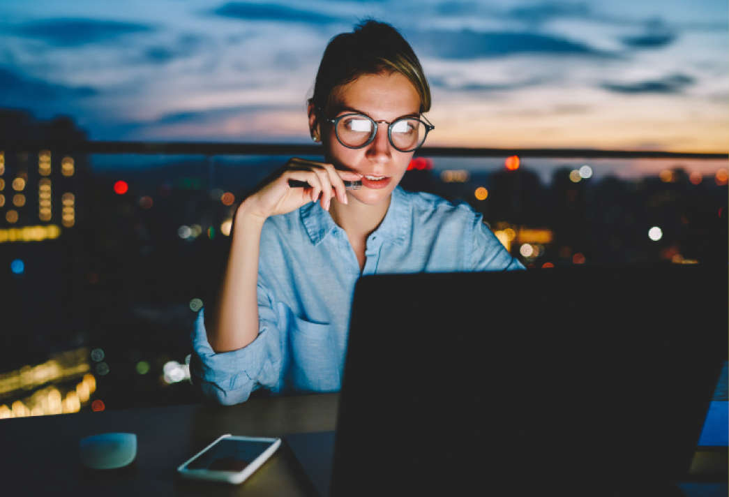 Image of woman working on laptop