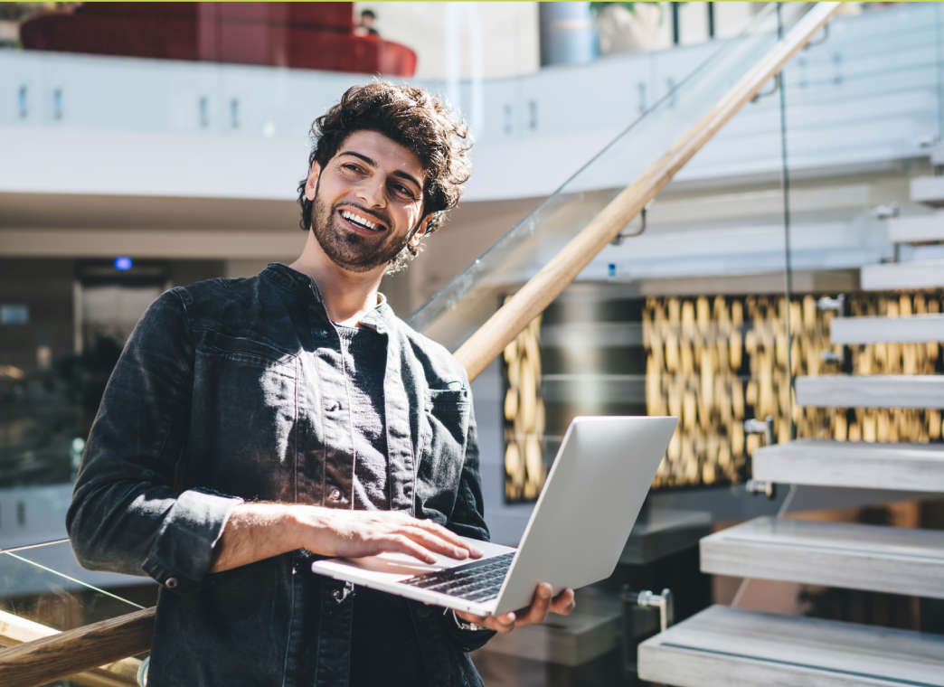 Image of man working on laptop